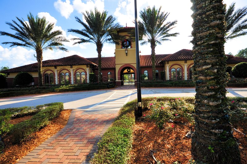 The palm-lined amenity center entrance at Durbin Crossing in St Johns